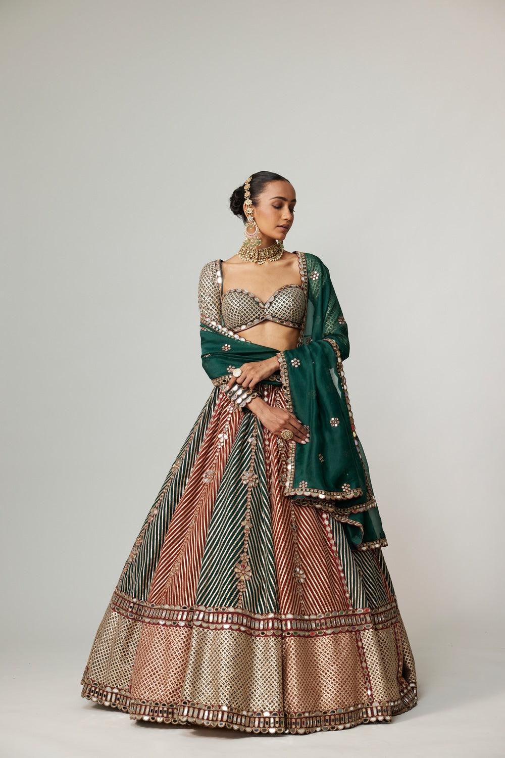 CRANBERRY FLOWER LINEAR LEEHNGA WITH FULL SLEEVE BLOUSE.