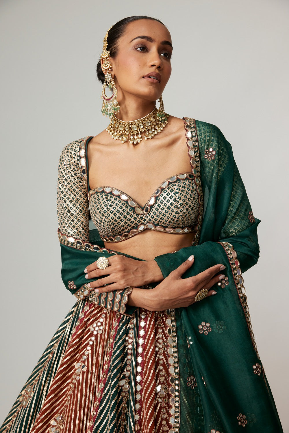 CRANBERRY FLOWER LINEAR LEEHNGA WITH FULL SLEEVE BLOUSE.