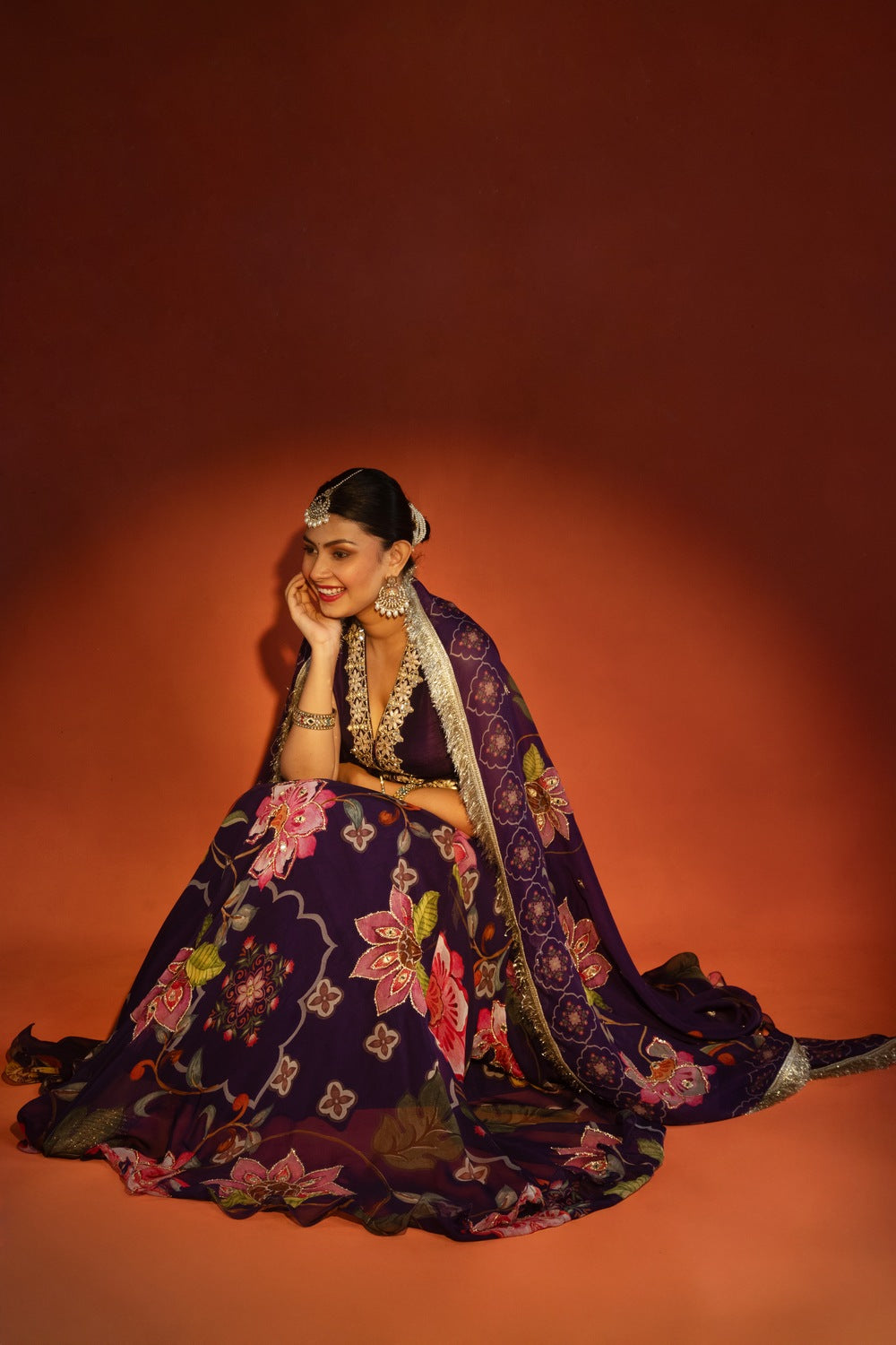 Purple floral lehenga with mirror-work waistcoat and placement dupatta
