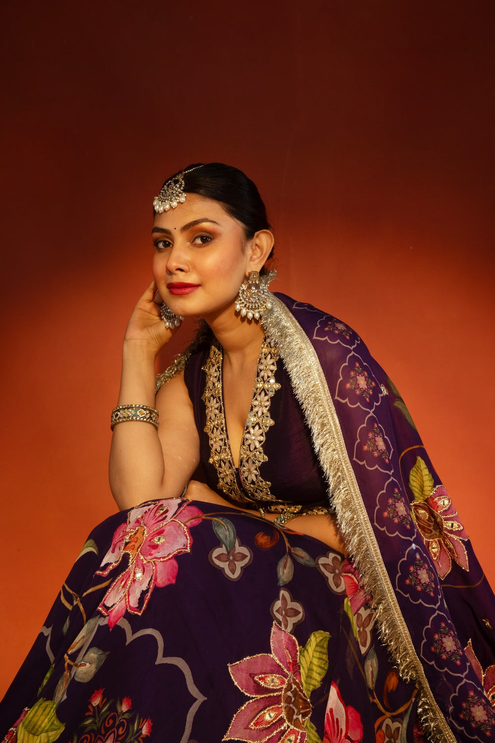 Purple floral lehenga with mirror-work waistcoat and placement dupatta