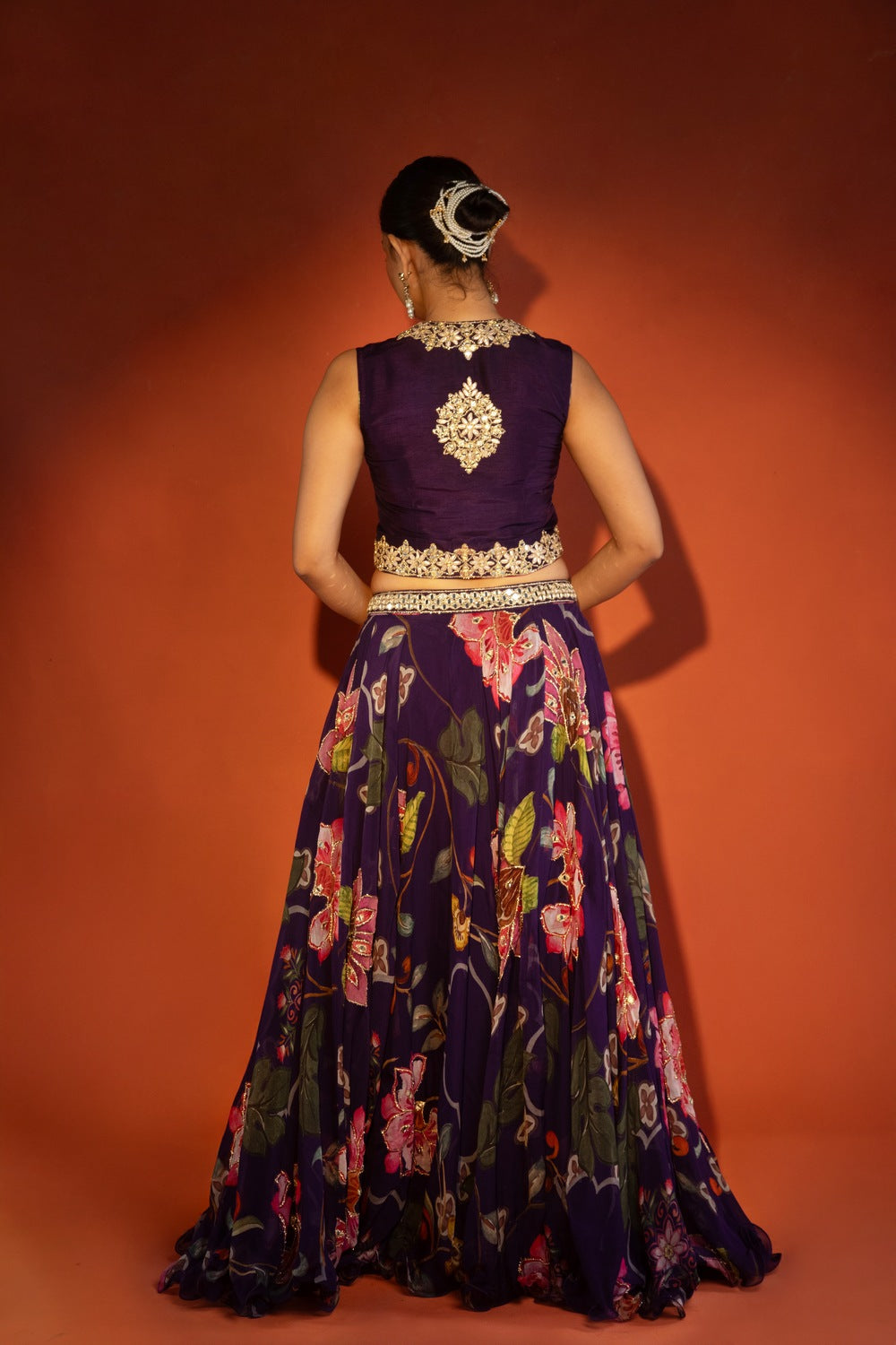 Purple floral lehenga with mirror-work waistcoat and placement dupatta