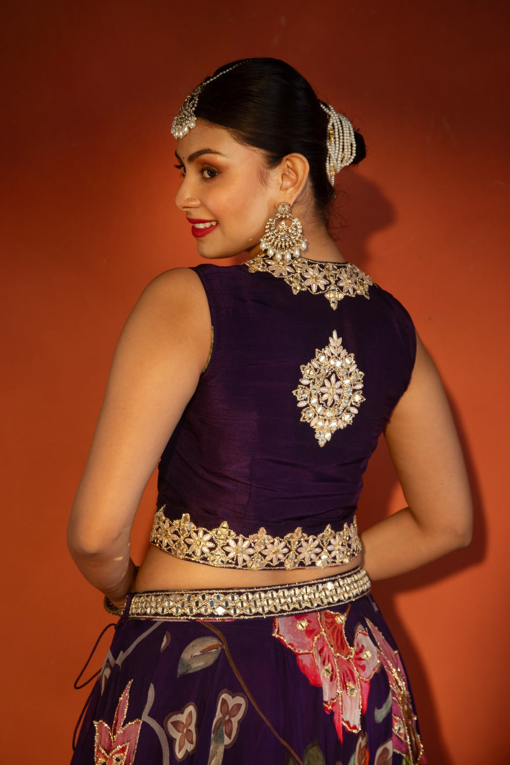 Purple floral lehenga with mirror-work waistcoat and placement dupatta