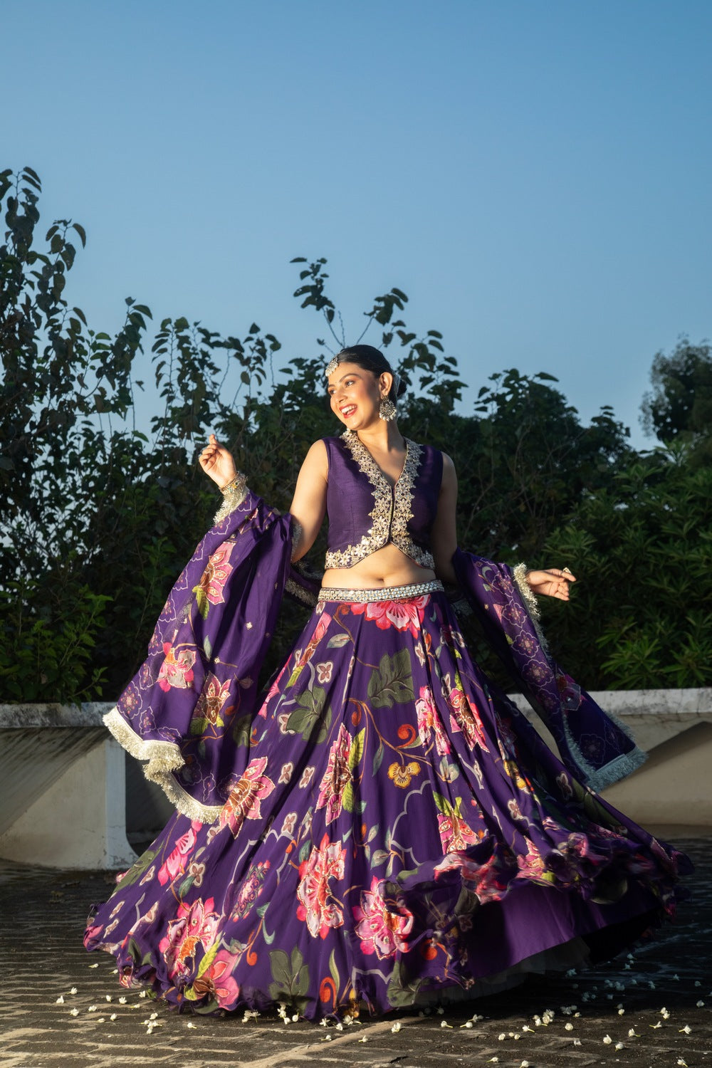 Purple floral lehenga with mirror-work waistcoat and placement dupatta