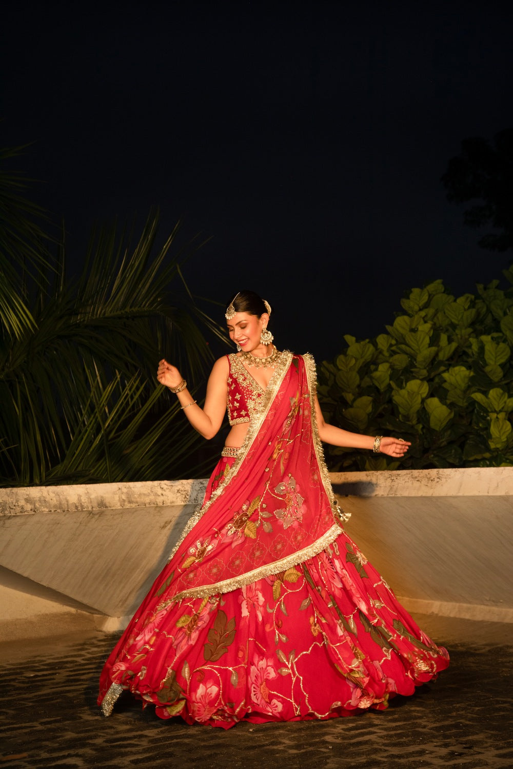 Red floral lehenga with mirror-work blouse and placement dupatta