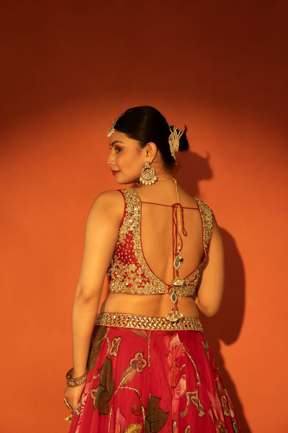 Red floral lehenga with mirror-work blouse and placement dupatta