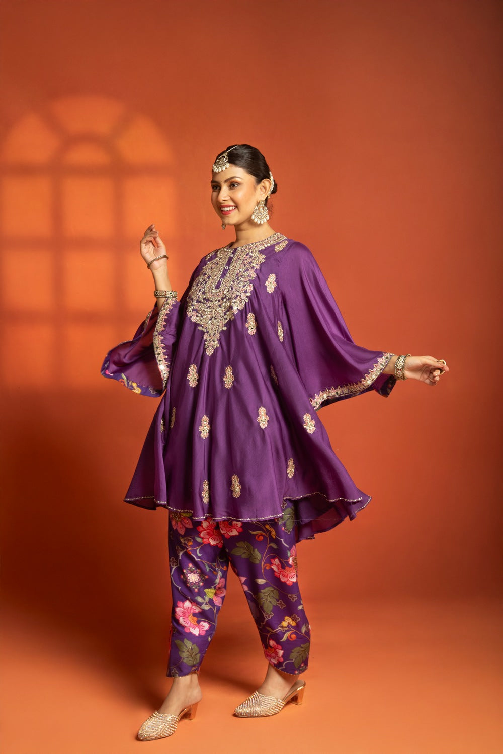 Purple Short Semi- Anarkali with a heavily Embroidered Neckline, Paired with Floral Printed Salwar Pants & Dupatta