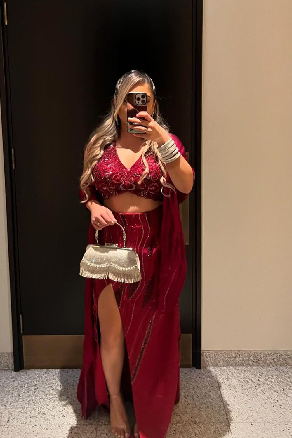 Kajal in Burgundy Halter Top And Skirt Set