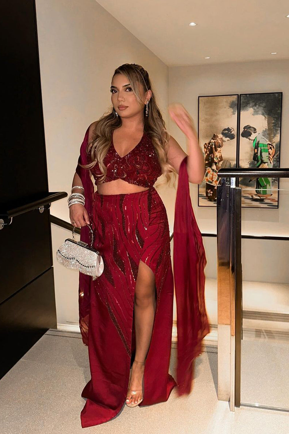 Kajal in Burgundy Halter Top And Skirt Set