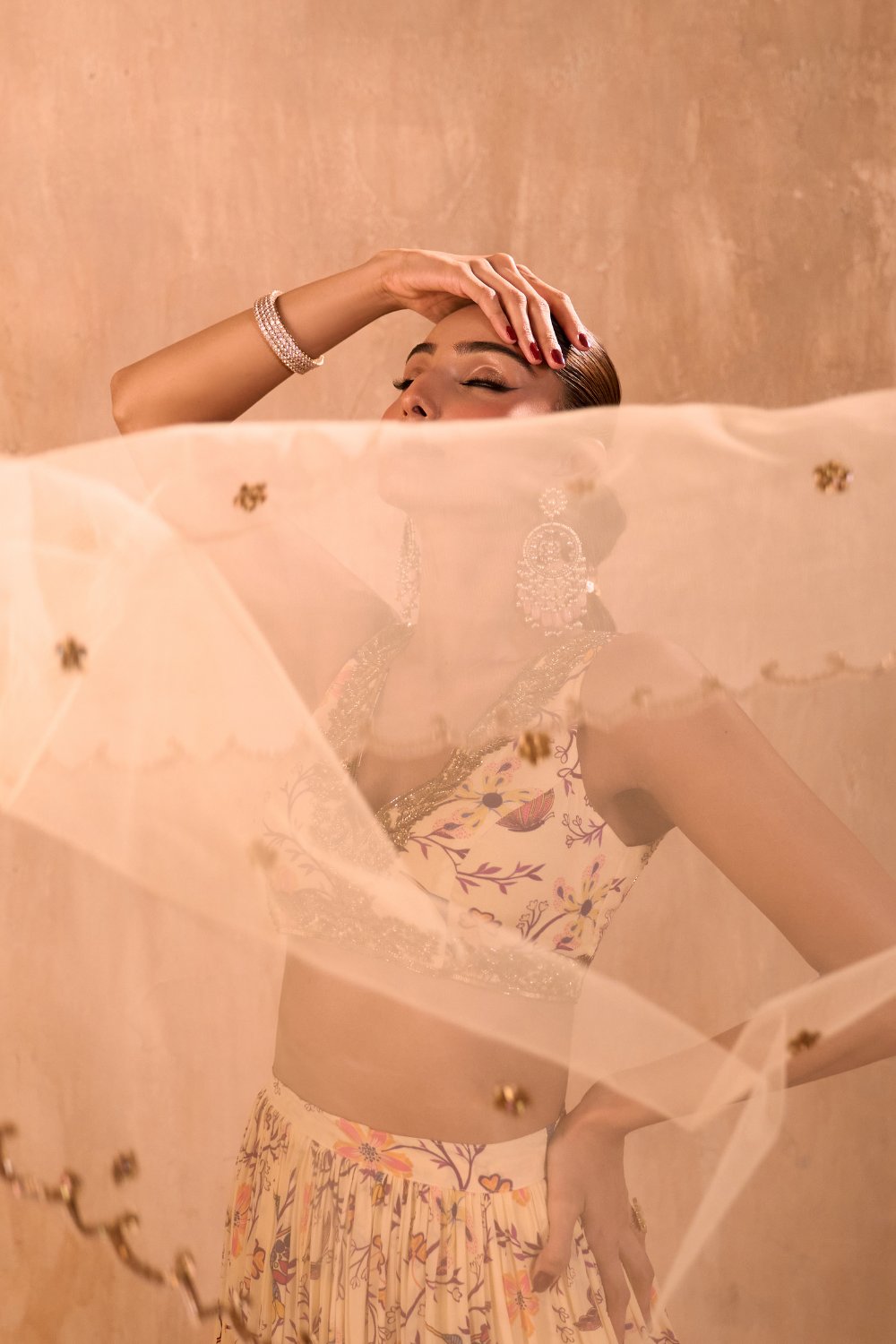 IVORY PRINT EMBROIDERED CHOLI, LAYERED LEHENGA AND DUPATTA SET