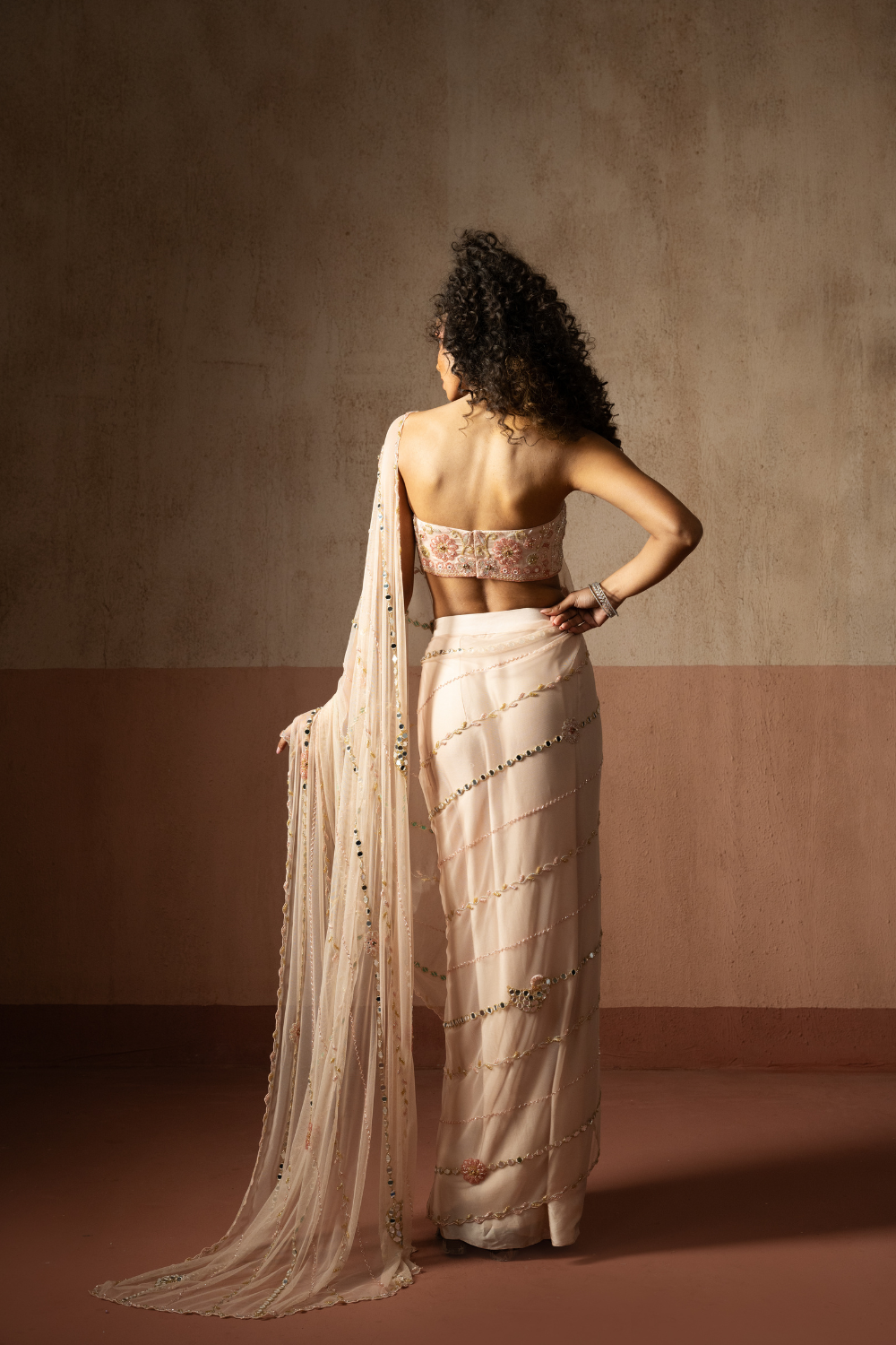 Predraped , baby pink ,  hand embroidered net & satin saree