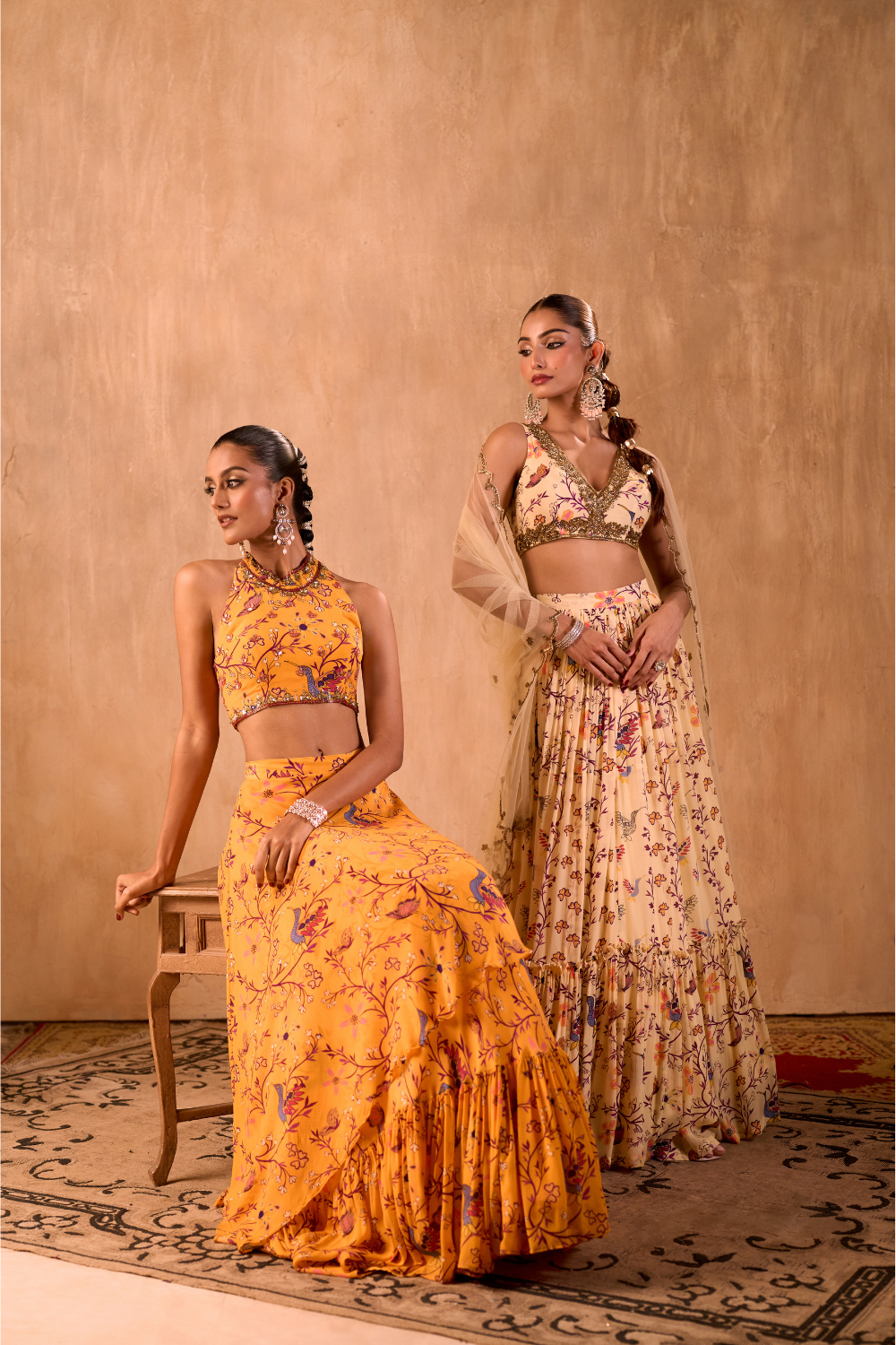 YELLOW PRINT EMBROIDERED HALTER CHOLI AND LAYERED LEHENGA SKIRT SET
