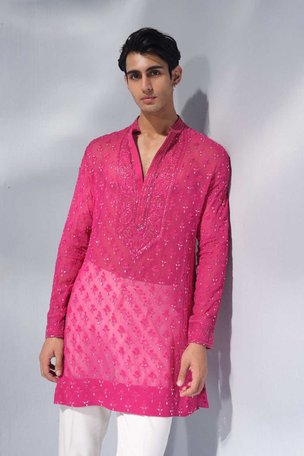 Hot pink chikankari kurta.