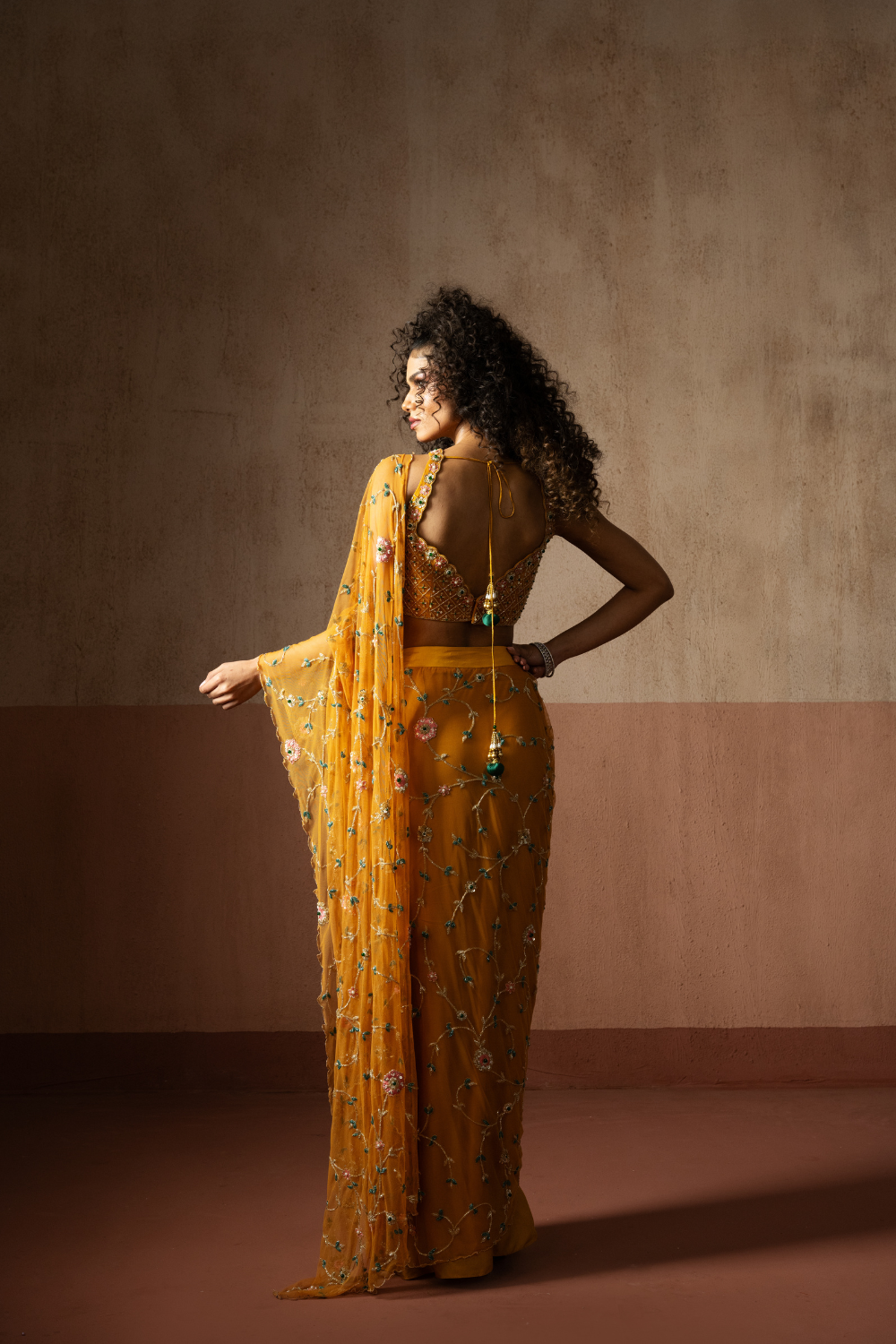 Predraped , mustard yellow , hand embroidered net & georgette saree