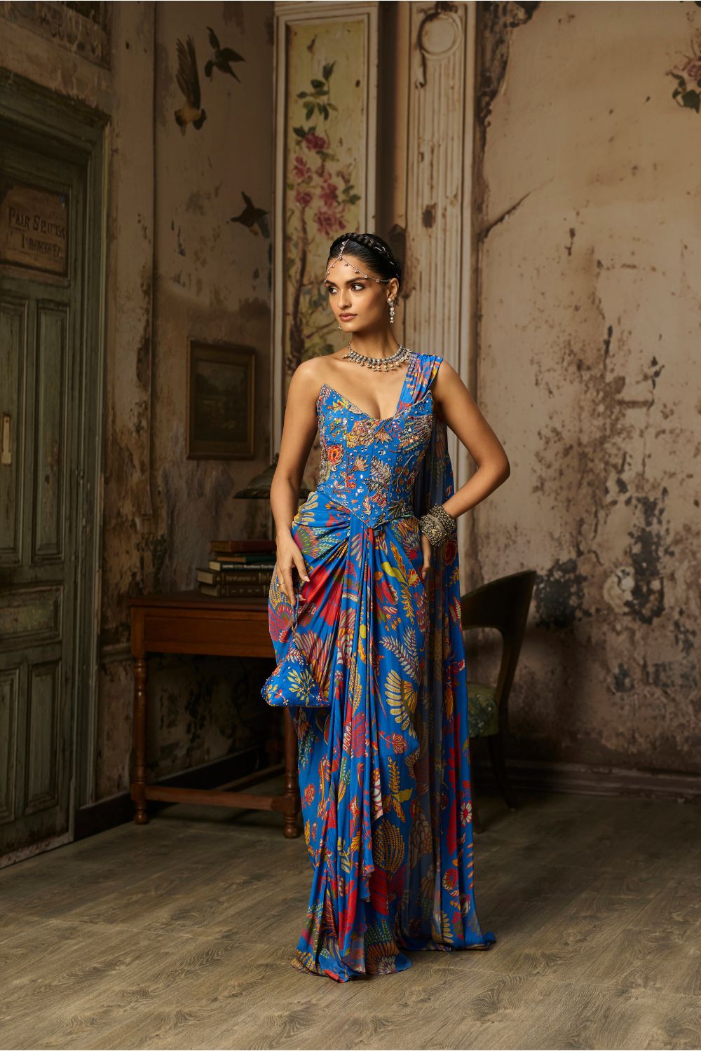 ELECTRIC BLUE PRINTED AND HIGHLIGHTED CORSET DHOTI SKIRT SAREE SET