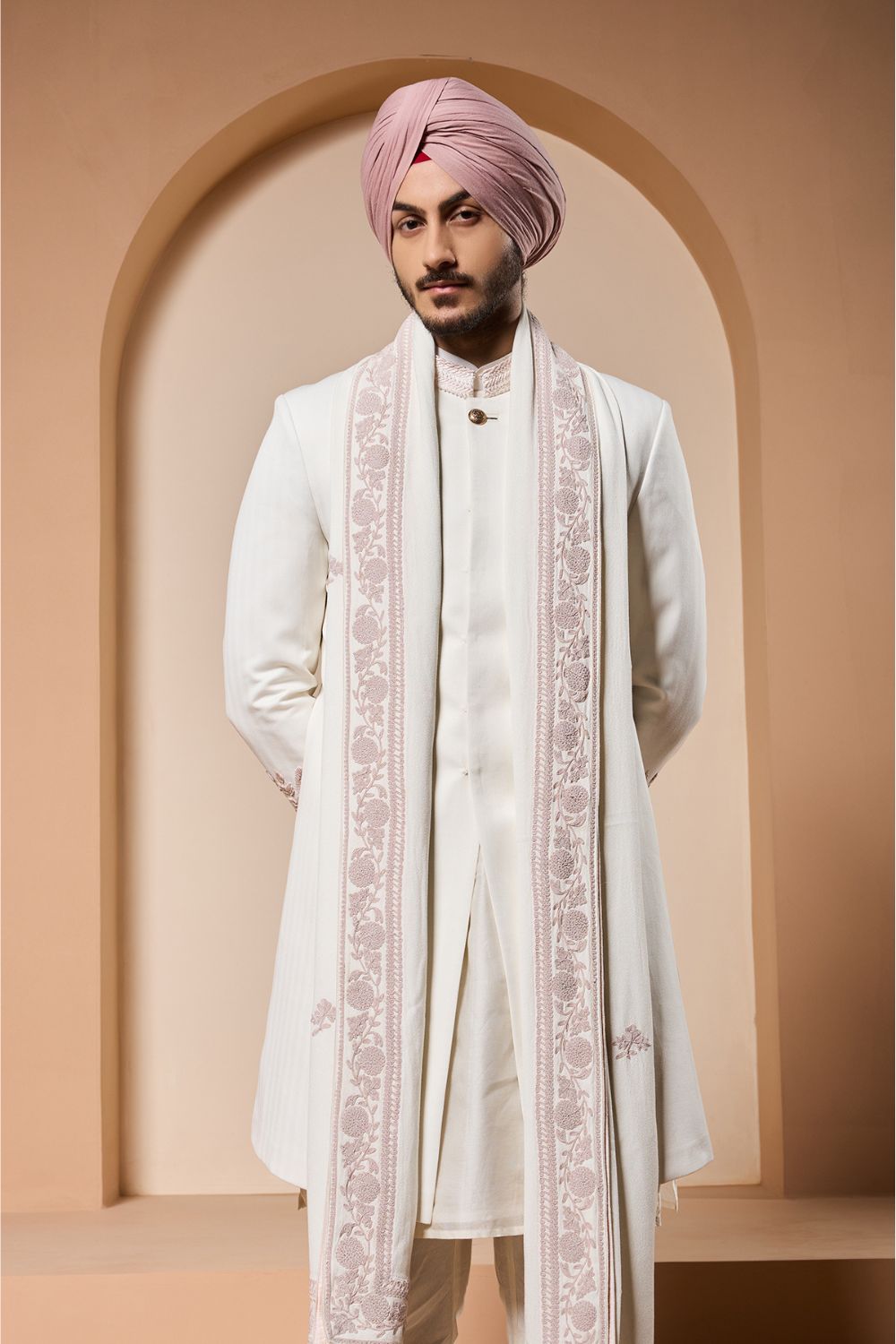 Ivory sherwani detailing with sequins and with thread work