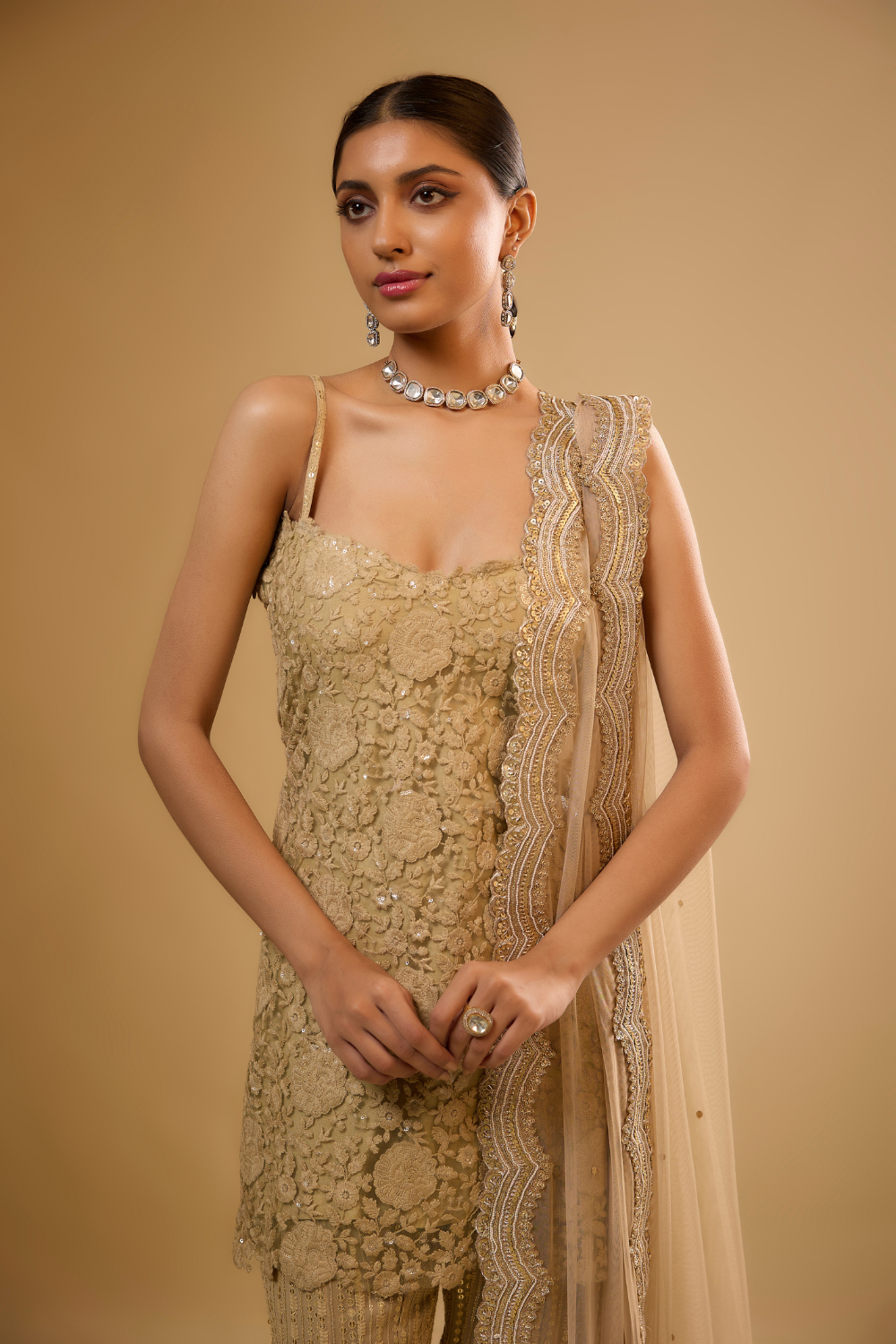Gold net kurta sharara set embroidered with sequin and threadwork