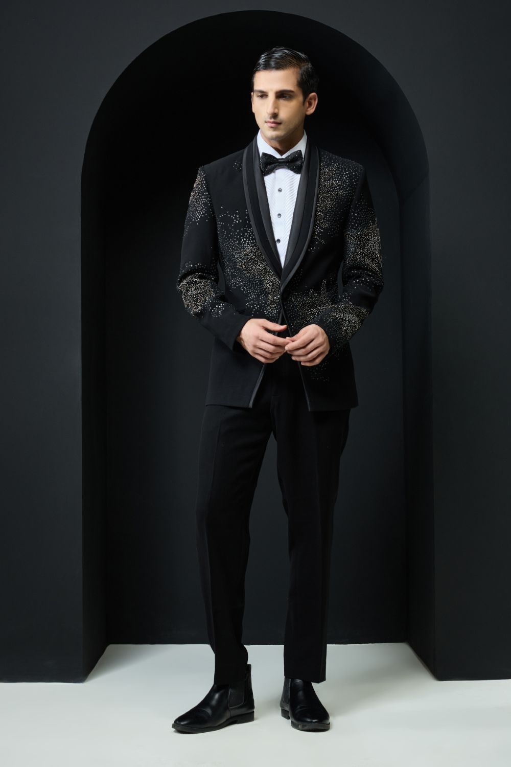 Black tuxedo highlighted with sequins, pearls,cutdana