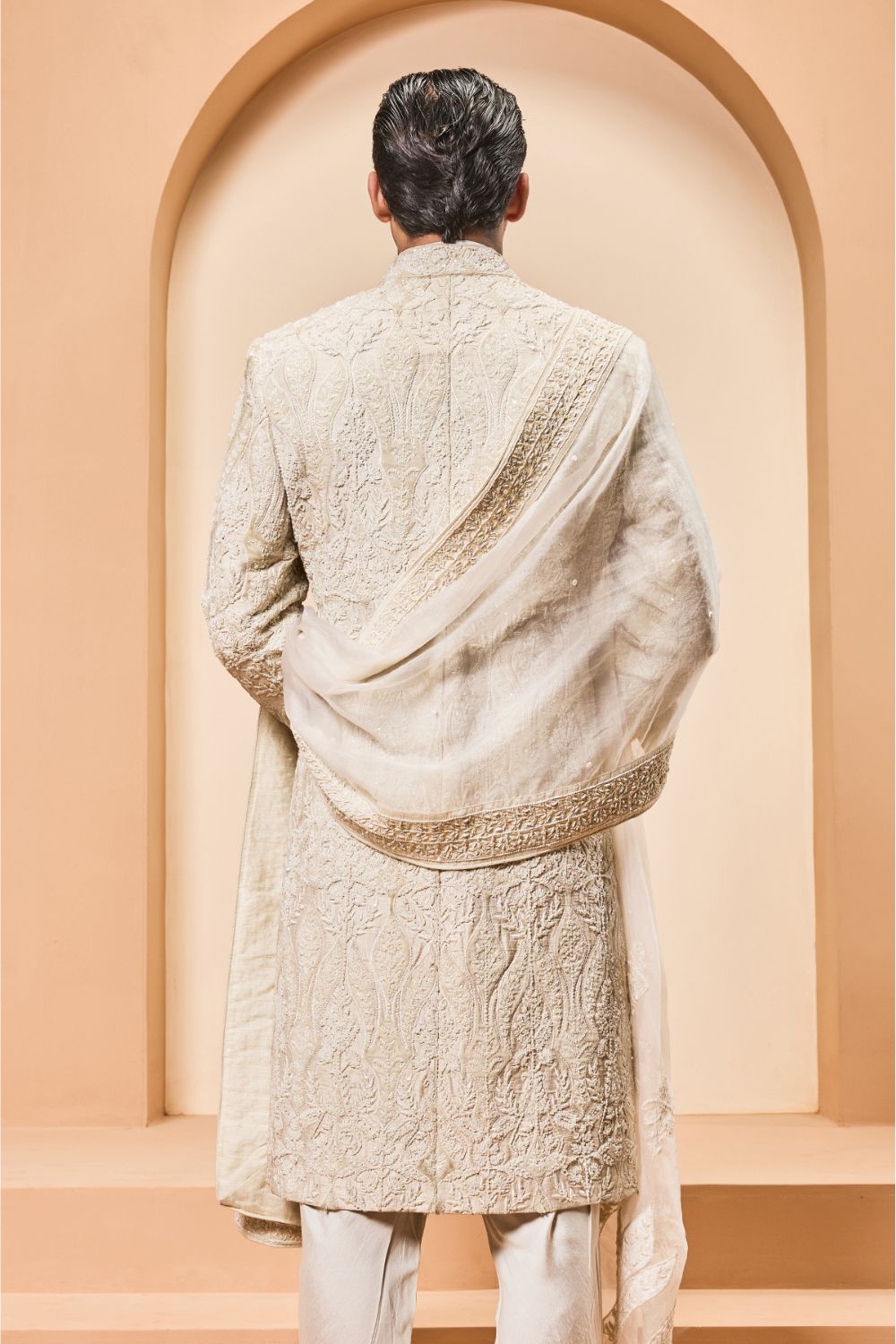 Ivory sherwani detailing with pearl,sequins and aplic work