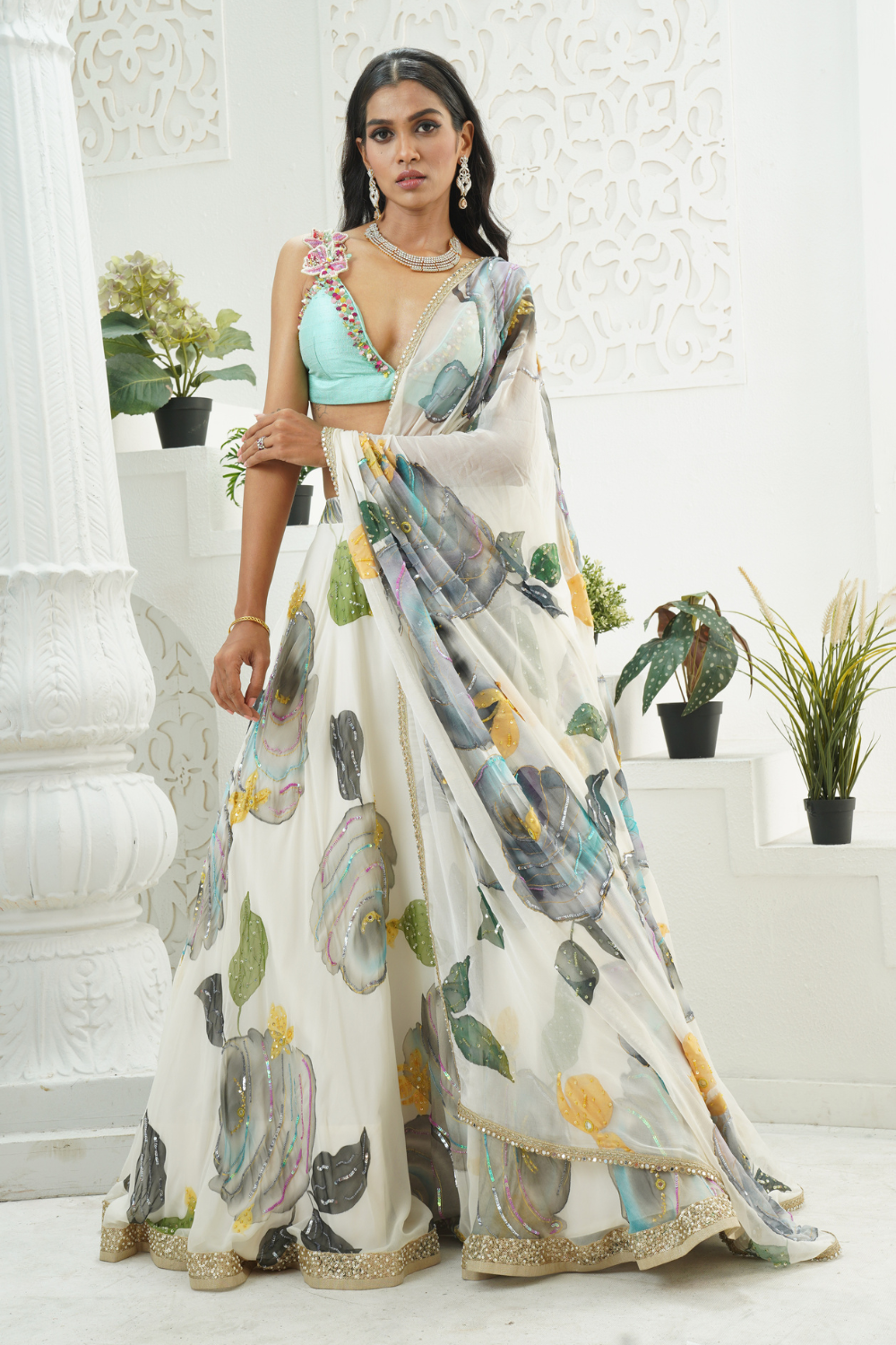 Ivory hand painted lehenga and Mint bralette blouse set