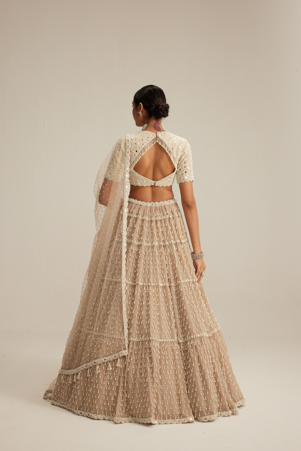 Light Beige Pearl Drop Multi Tier Lehenga With High Neck Blouse Set