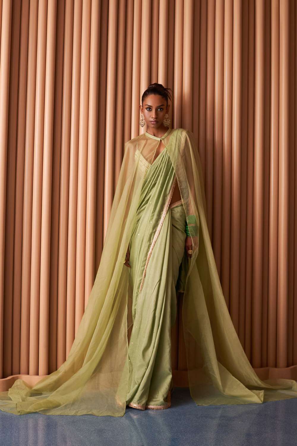 Shreen Green Saree with a cape