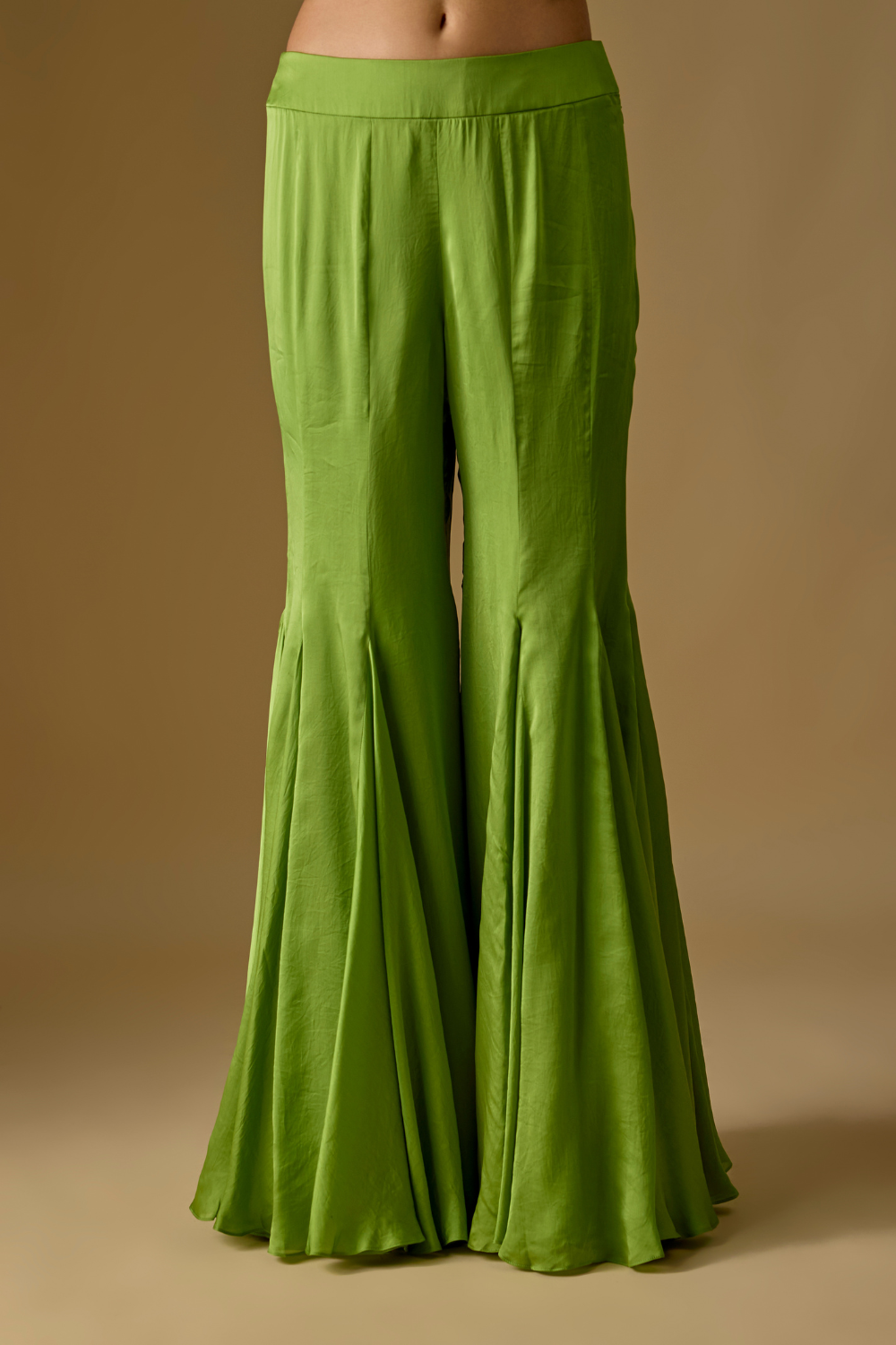 Driftlyn- Olive Green hand-embroidered short kurti paired with sharara and matching dupatta in satin organza and tulle fabric.