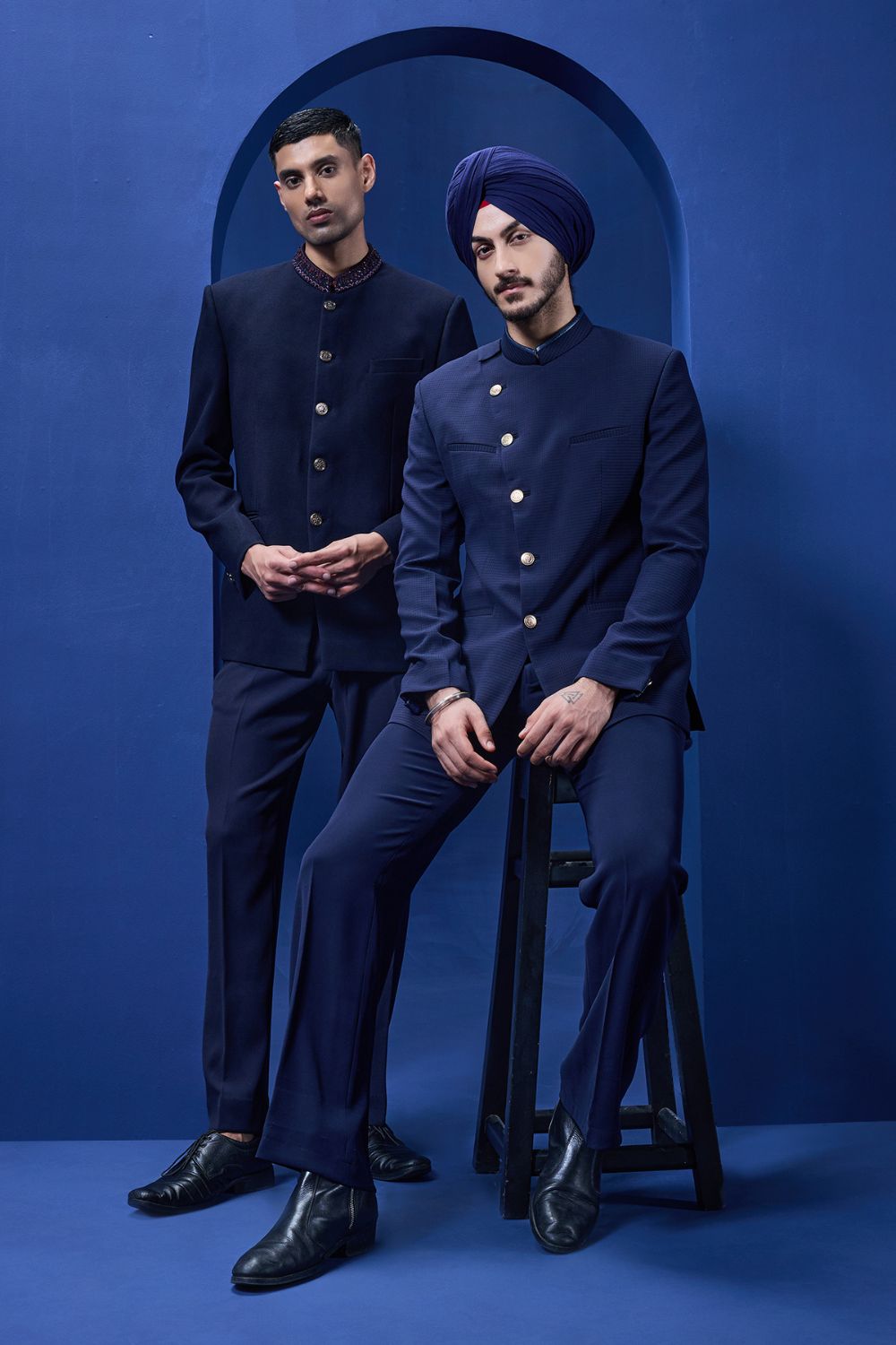 Navy blue bandhgala detailing with golden button satin taping