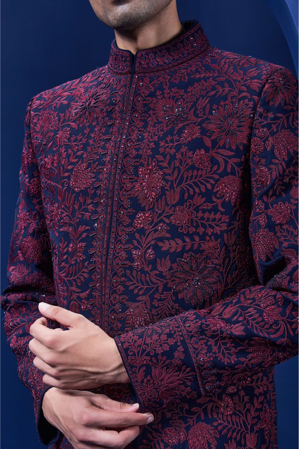 Navy blue Indo Western highlighted with sequins, pearls and wine thread work