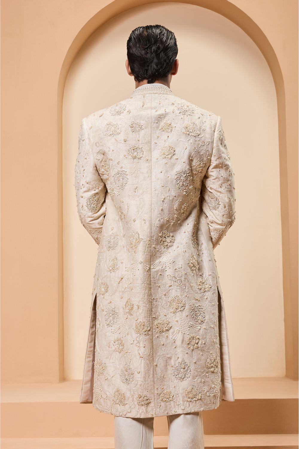 Ivory sherwani detailing with pearl,sequins and thread work