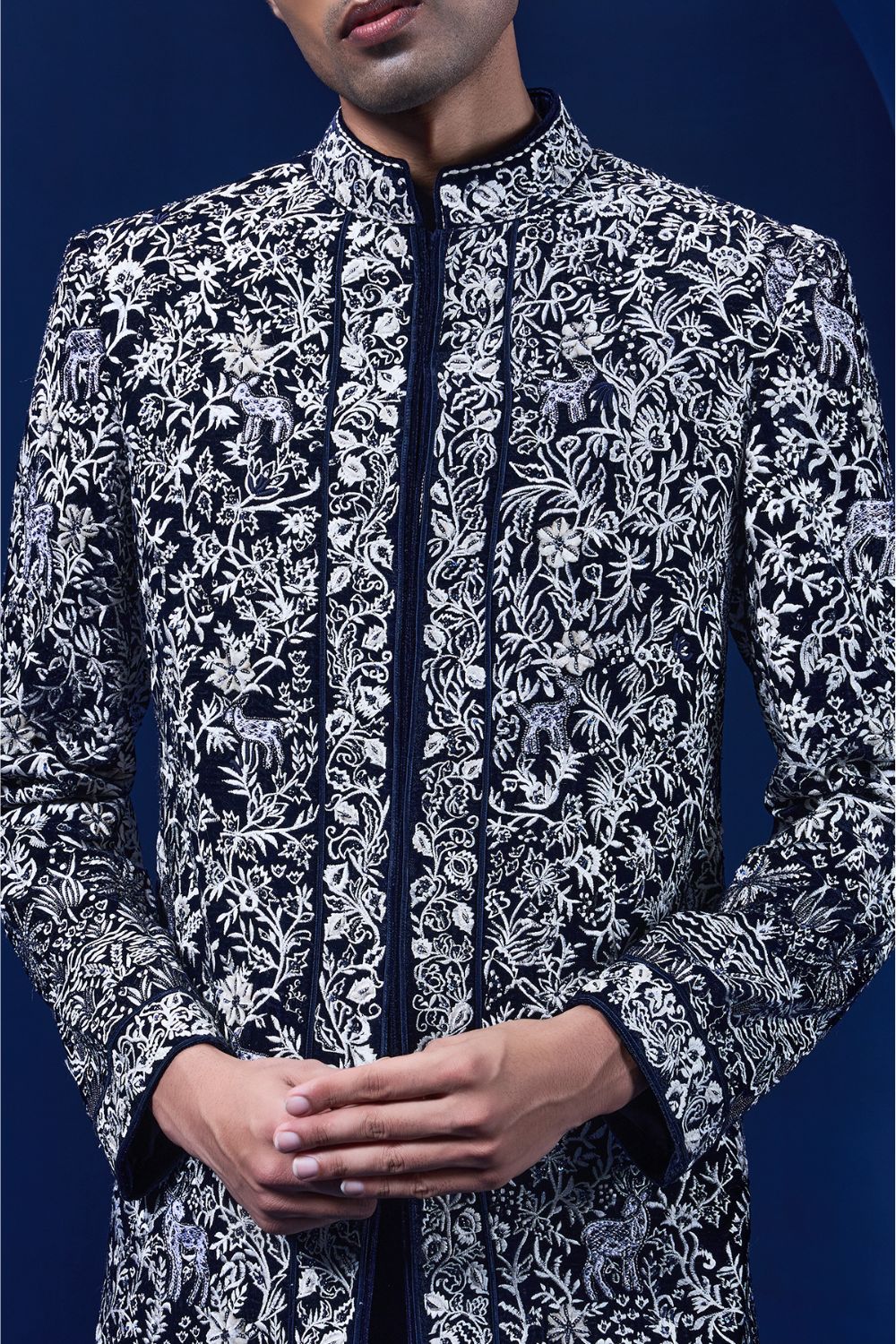 Navy blue Indo Western highlighted with sequins, pearls and thread work