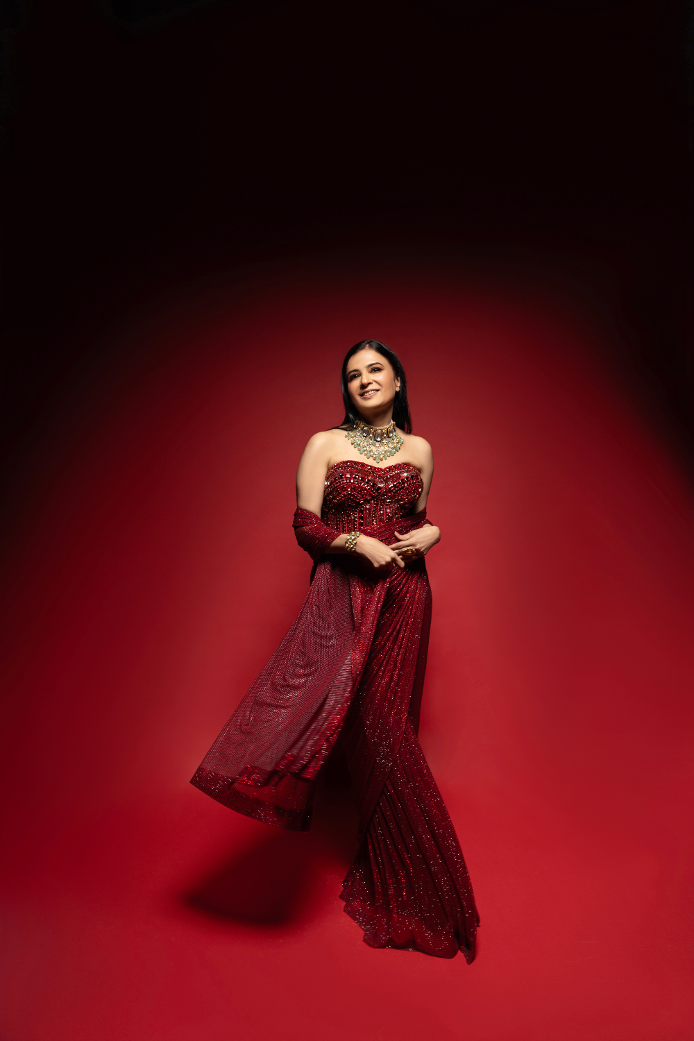 Divya Gurwara in Crimson Stardust Drape Set
