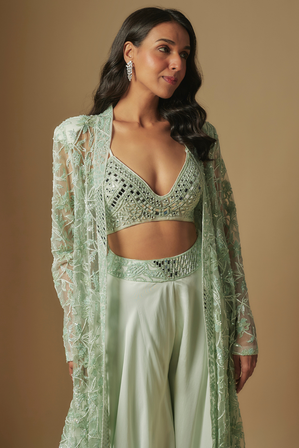 Avreal mirror work blouse paired with embroidered jacket and sharara