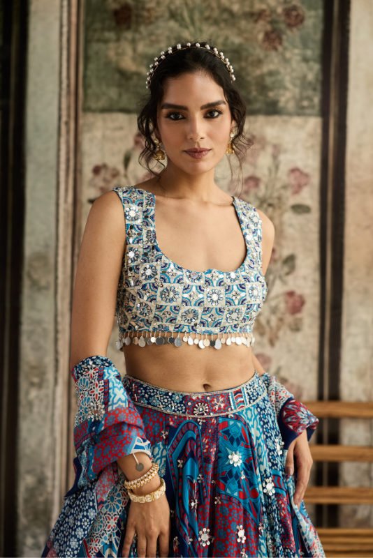 IVORY BUTTA PRINT AND HIGHLIGHTED BLOUSE WITH TEAL PRINT AND HIGHLIGHTED LEHENGA SET
