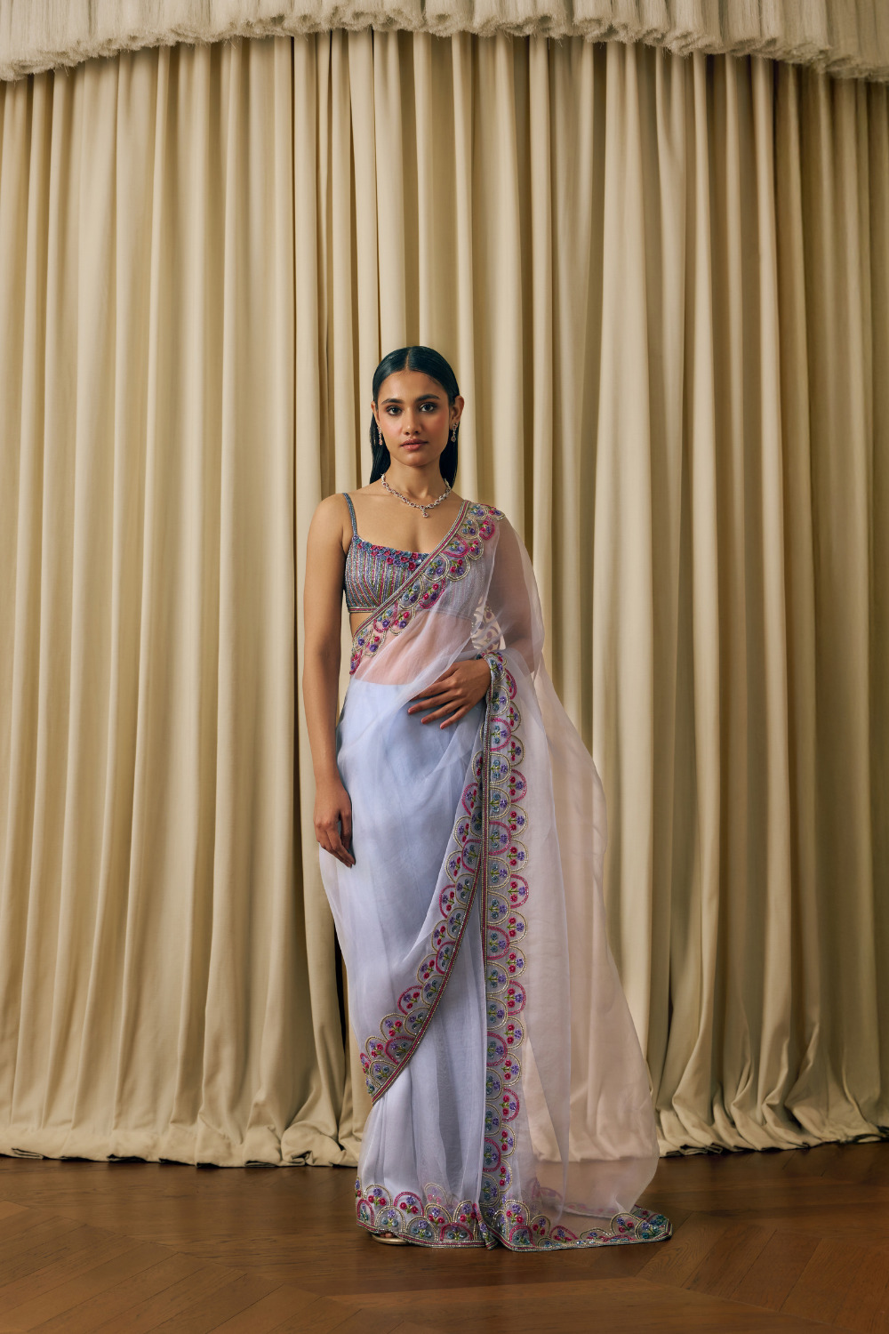 Hand embroidered saree with a sequin blouse