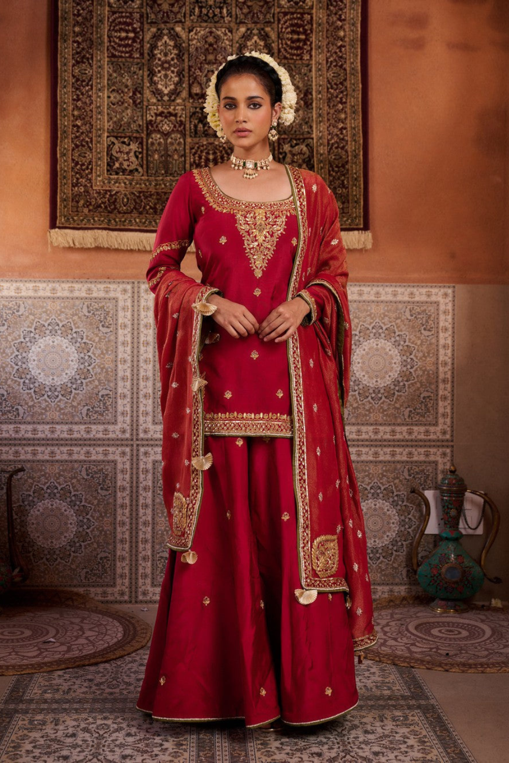 Red upada silk kurti, sharara and shimmer tissue dupatta