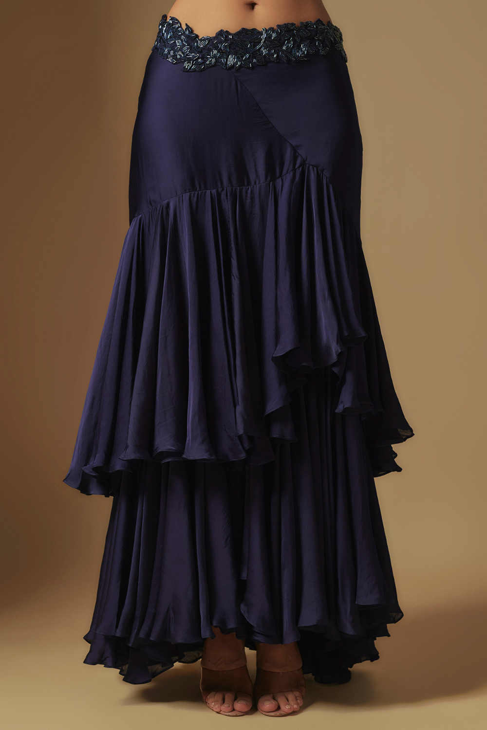 Marasu Mirror work blouse paired with hand embroidered cape and ruffled skirt