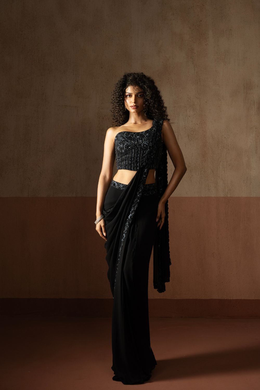 Predraped , black hand embroidered georgette saree