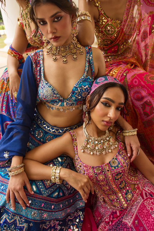 FUSCHIA PRINT AND HIGHLIGHTED CORSET BLOUSE LEHENGA SET