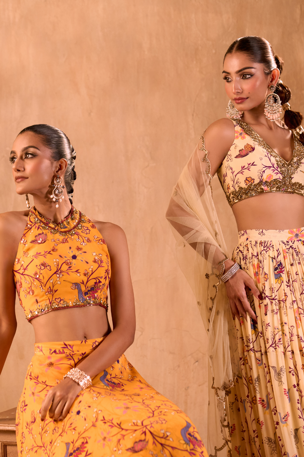 YELLOW PRINT EMBROIDERED HALTER CHOLI AND LAYERED LEHENGA SKIRT SET