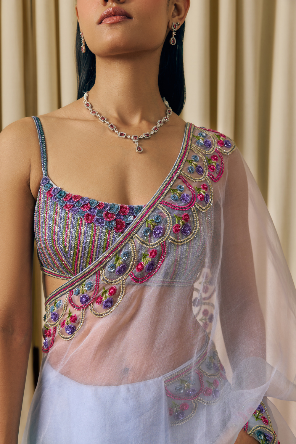 Hand embroidered saree with a sequin blouse