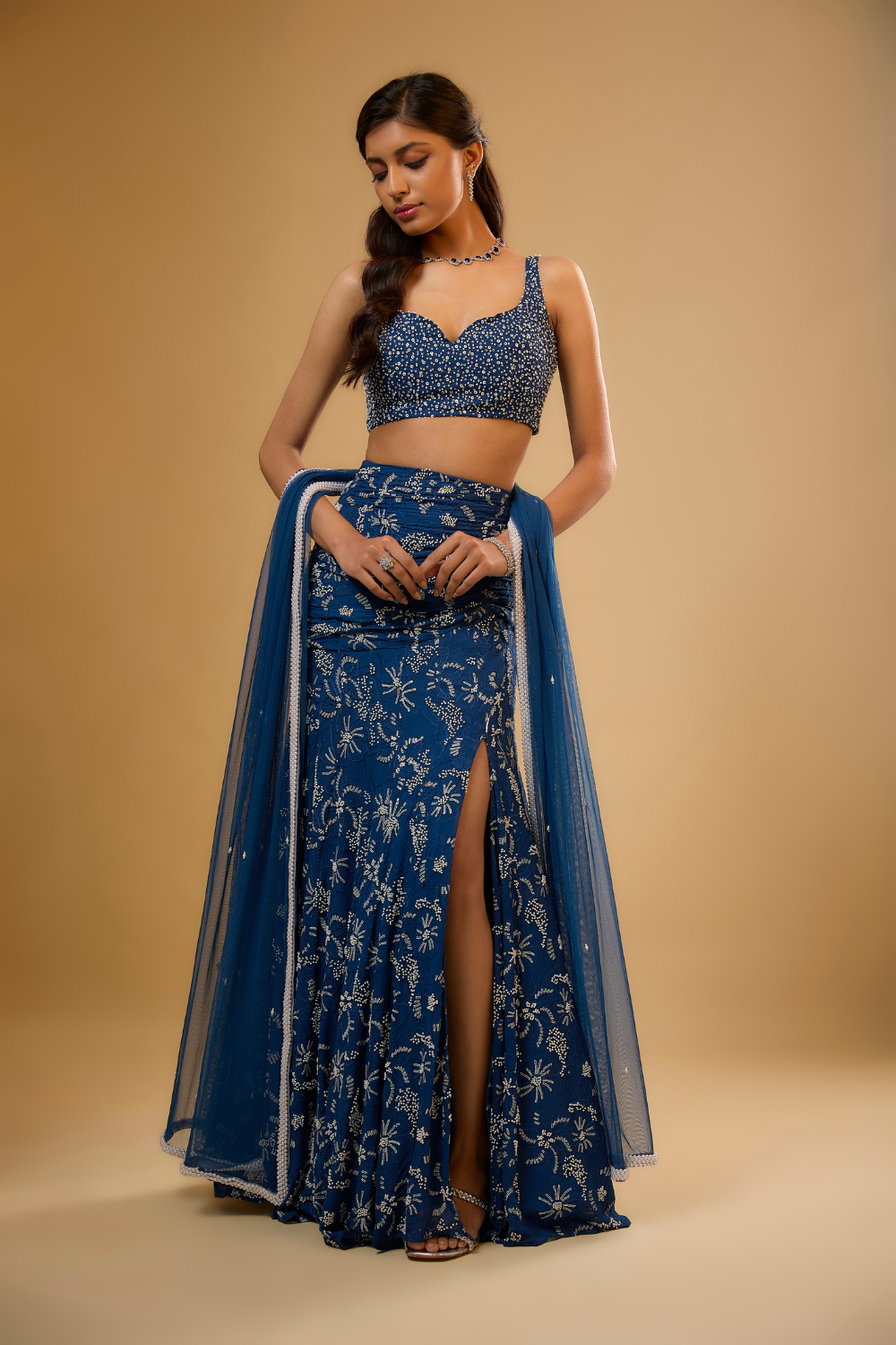 Egyptian blue georgette lehenga set embroidered with sequins, glass beads & threadwork