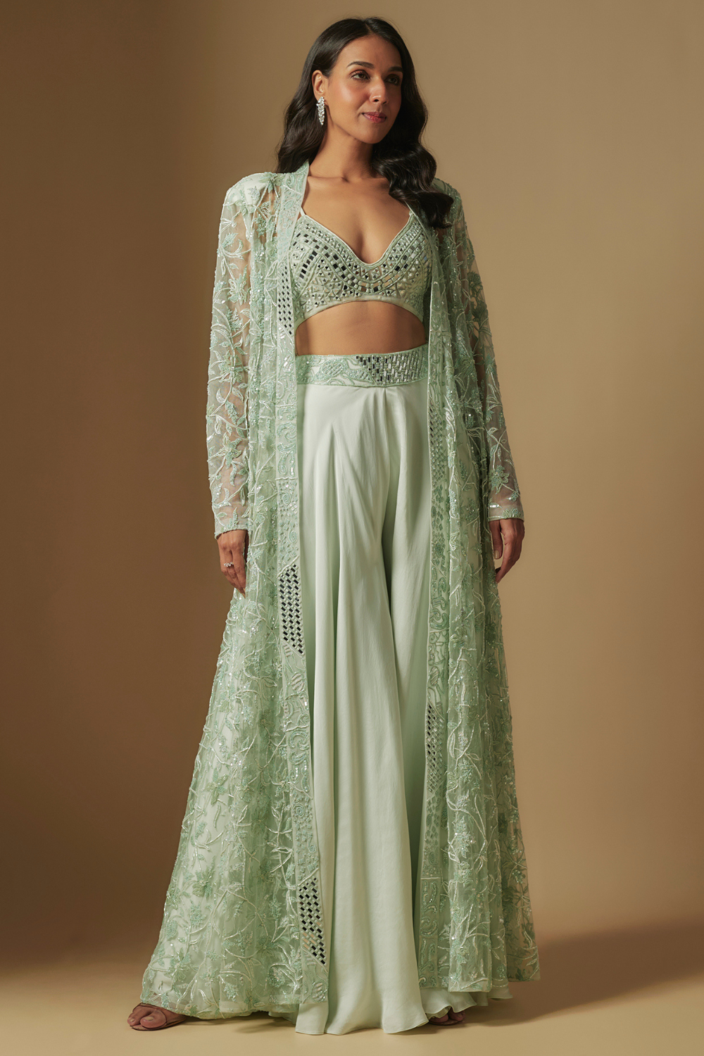 Avreal mirror work blouse paired with embroidered jacket and sharara