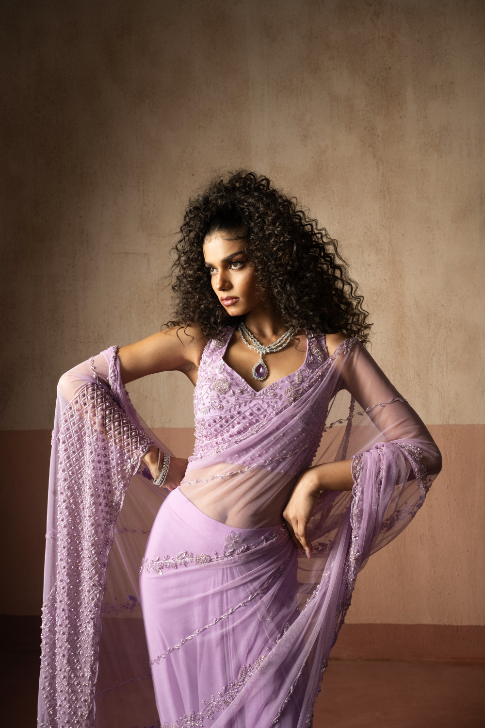 Predraped , lavender, hand embroidered net & georgette saree