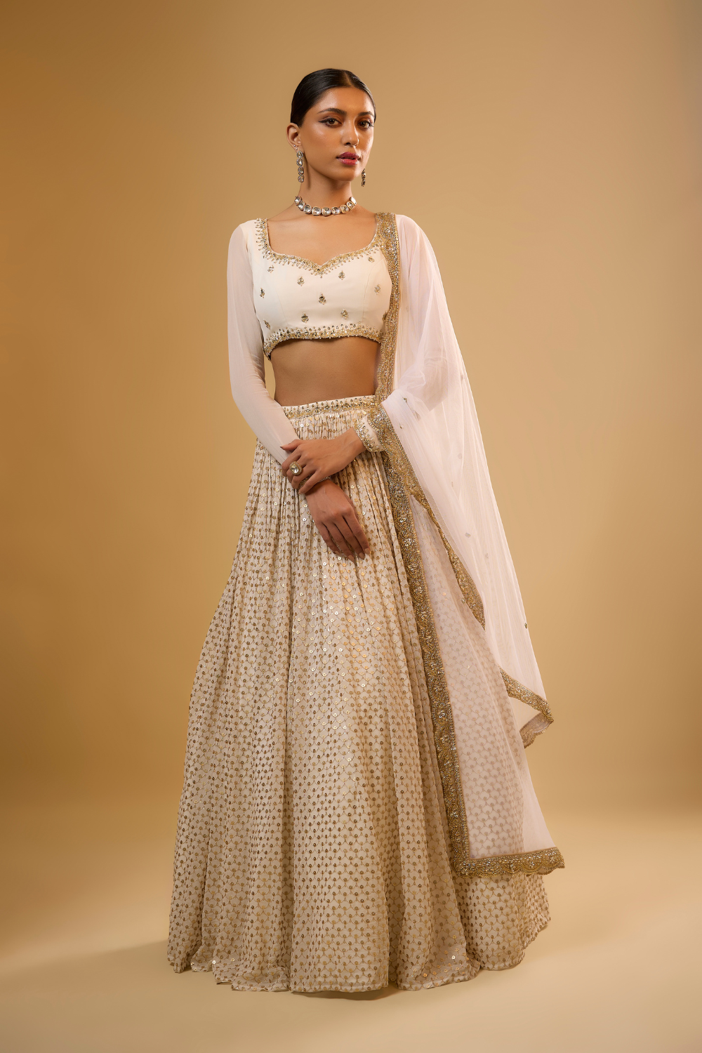 Vanilla white georgette lehenga set embroidered with mirrors and gold sequins