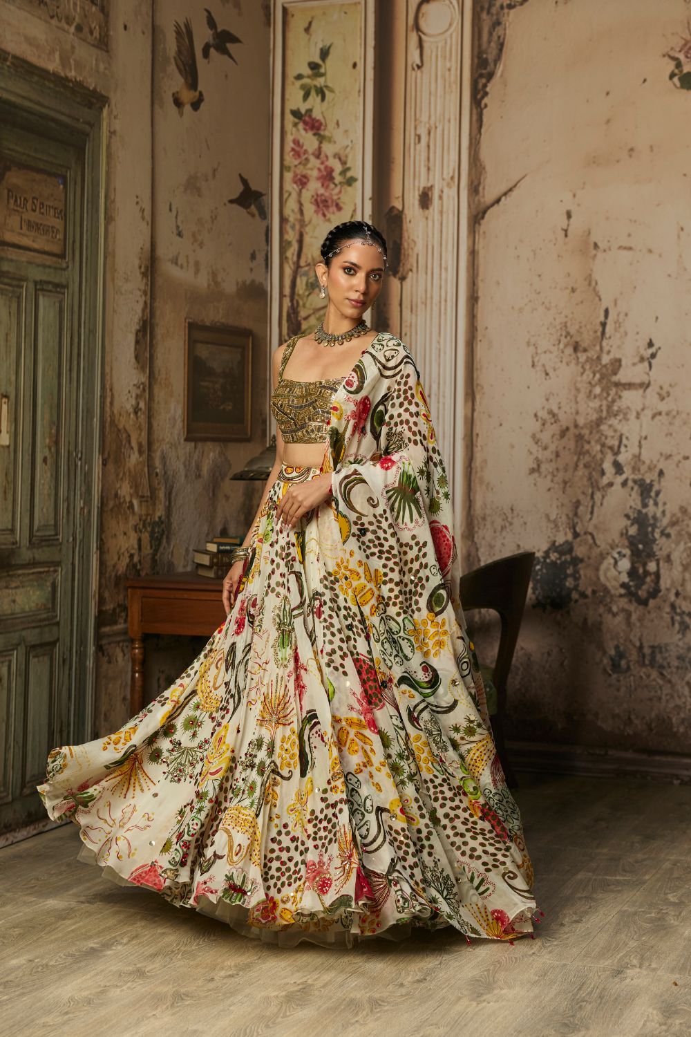 LIGHT GOLD EMBELLISHED BLOUSE AND HIGHLIGHTED LEHENGA SET