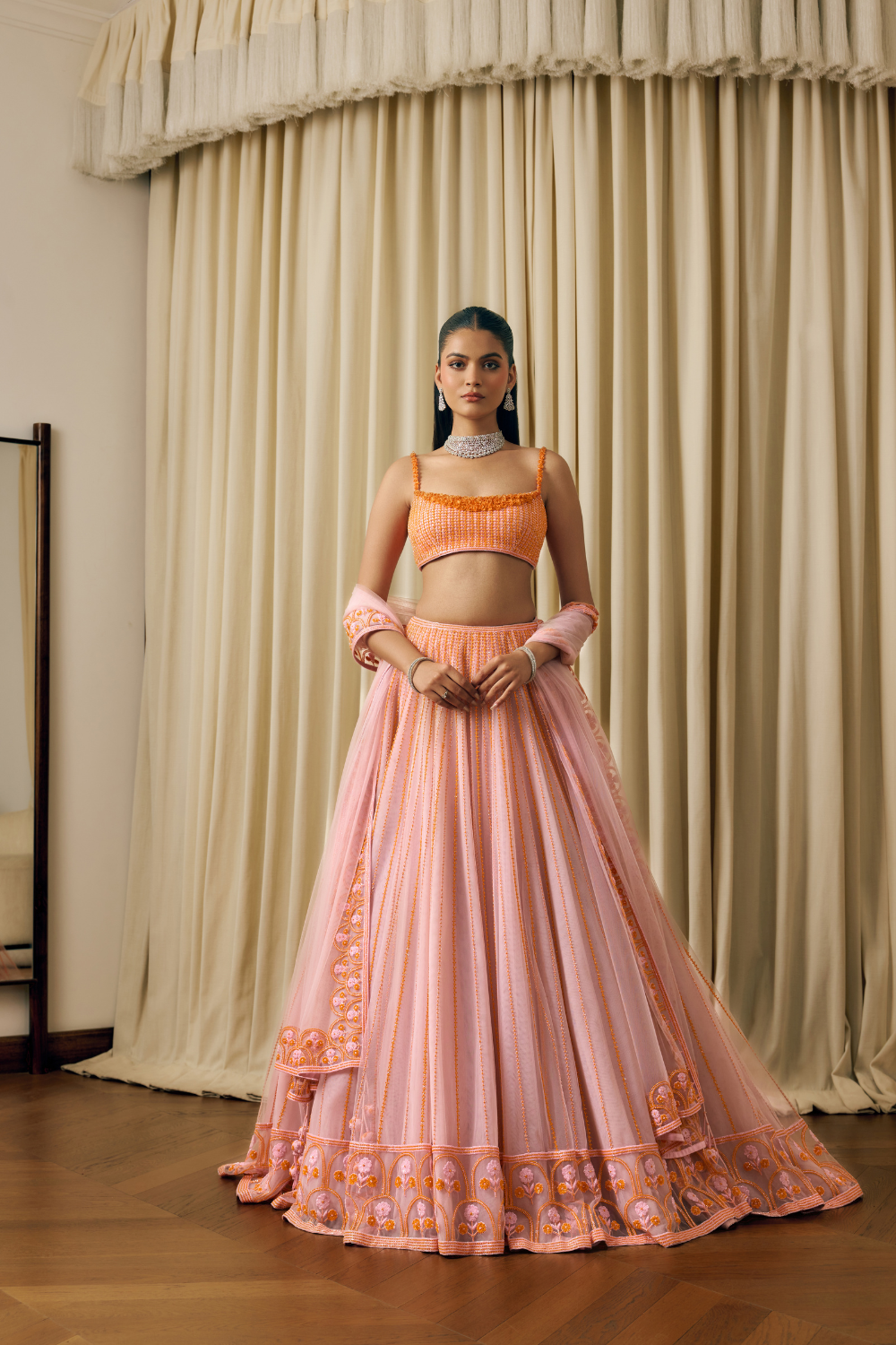 Linear embroidered lines lehengas with border