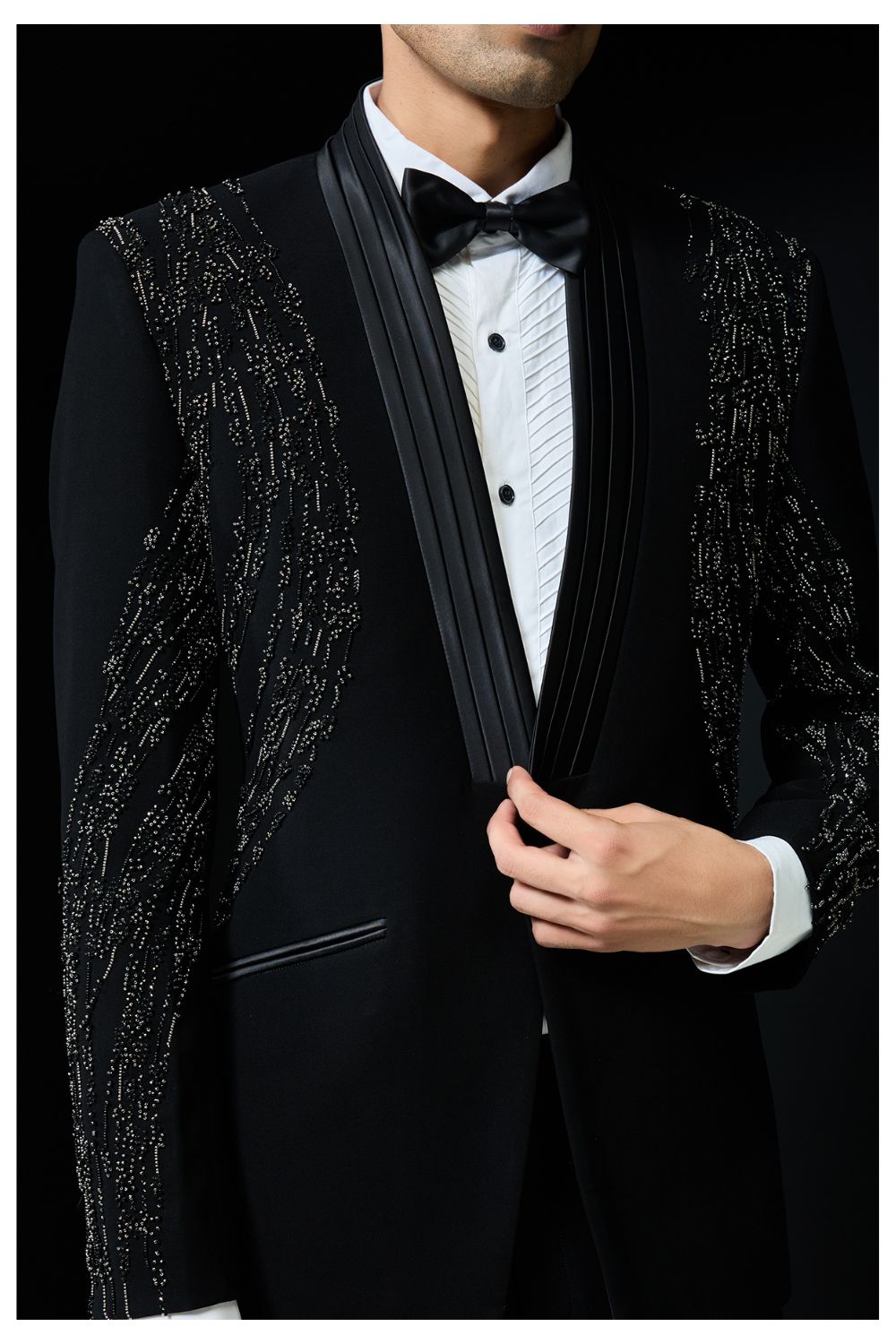 Black tuxedo highlighted with pearls and cutdana