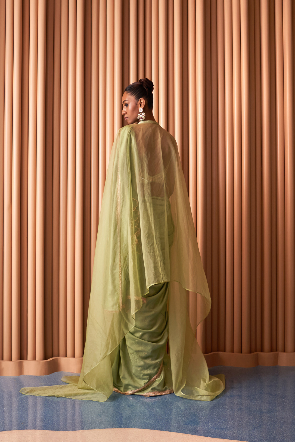 Shreen Green Saree with a cape