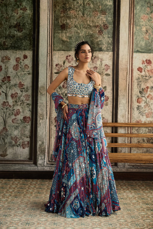 IVORY BUTTA PRINT AND HIGHLIGHTED BLOUSE WITH TEAL PRINT AND HIGHLIGHTED LEHENGA SET