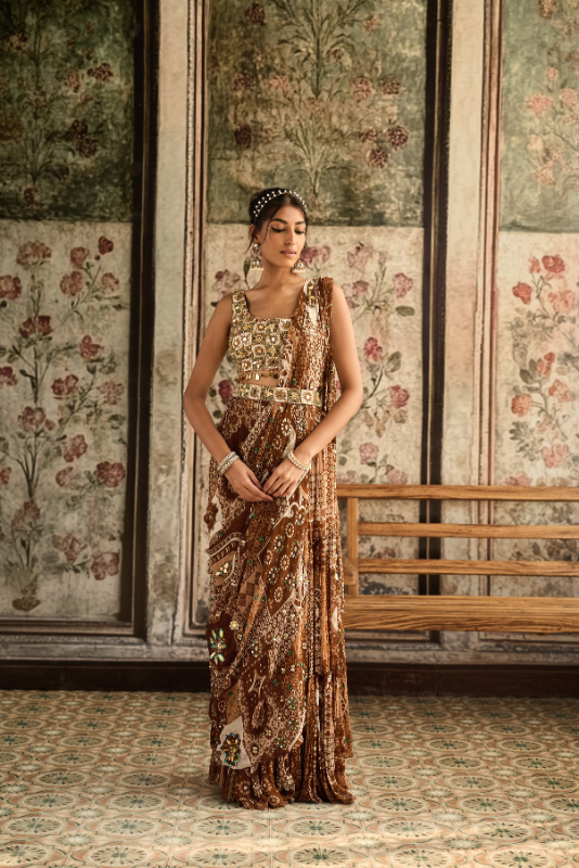IVORY BUTTA PRINT AND HIGHLIGHTED SQUARE NECK BLOUSE WITH CARAMEL PRINT  AND HIGHLIGHTED TIERED SKIRT  SAREE SET